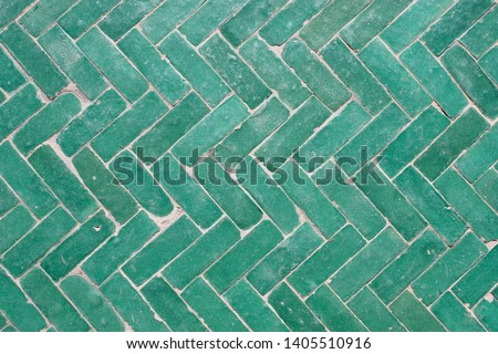 Arabic green herringbone tile pattern background