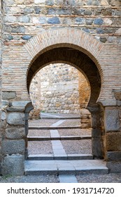 An Arabic Horseshoe Arch Entrance Through The Old City Wall In Toledo