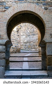 An Arabic Horseshoe Arch Entrance Through The Old City Wall In Toledo