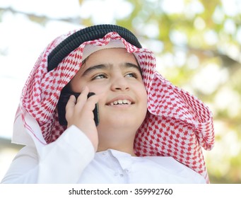 Arabic Kid Talking On Phone