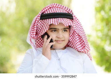 Arabic Kid Talking On Phone