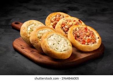 Arabic Meat And Cheese Sfiha On The Table.