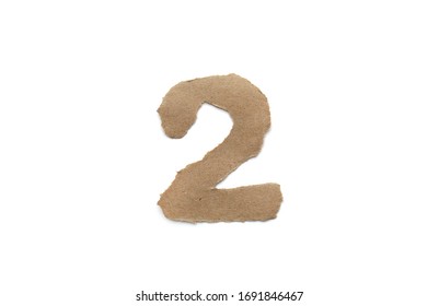 Arabic number symbol isolated over white background. English flat brown torn paper number 2