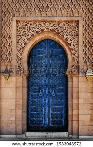 Arabic oriental styled door in Morocco Pantone classic blue color