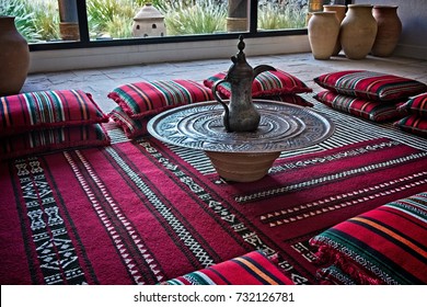 Arabic Setting For A Majlis With Traditional Cushions And An Arabic Coffee Pot In The Middle. Muscat, Oman