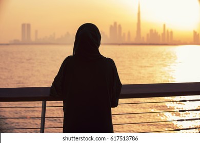 Arabic woman in love with the view of Dubai