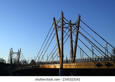 ARAD, 18 MARCH 2022: Urban landscape of the steel structure bridge over Mures River in Arad, Romania, Europe