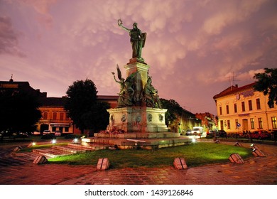 ARAD, ROMANIA, 28 JUNE, 2019: Stormy clouds over the monument and buildings of the Reconciliation Park of Arad, Romania, Europe