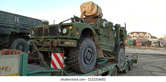 Arad,  Romania - February 12 2022: US Army Vehicle Convoy The Way To Military Maneuvers In Romania