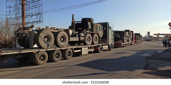 Arad,  Romania - February 12 2022: US Army Vehicle Convoy The Way To Military Maneuvers In Romania