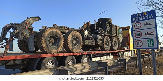 Arad,  Romania - February 12 2022: US Army Vehicle Convoy The Way To Military Maneuvers In Romania