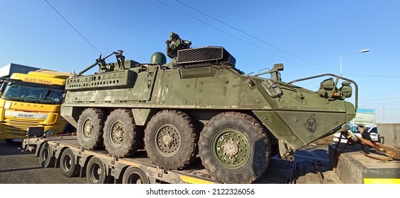 Arad,  Romania - February 12 2022: US Army Vehicle Convoy The Way To Military Maneuvers In Romania