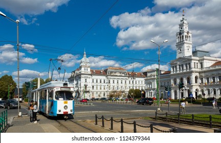 ARAD, ROMANIA - SEPTEMBER 13, 2017: City tram in Arad on town hall square in sunny autumn day, Romania