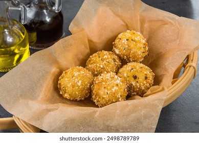 Arancini - italian fried rice balls with filling
Deep fried cottage сheese balls.
Roasted breaded mozzarella cheese balls - Powered by Shutterstock