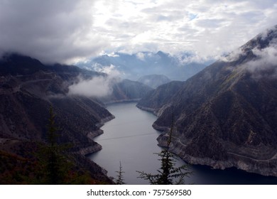 Aras River Through Mountains In A Cloudy Sky