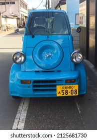 Arashiyama, Japan - February 13, 2018: A Daihatsu Midget 2 parked on the side of the street