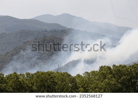 Arbucies, Cataluña - Spain; October, 25, 2023 - Aerial firefighting resources were used to extinguish the fire in Montseny's Natural Park, which started at noon