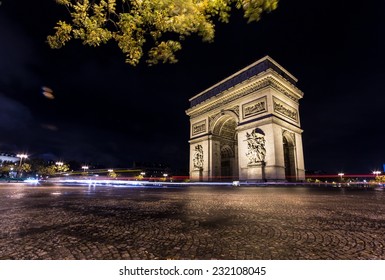 Arc De Triomphe By Night With Traffic Lights