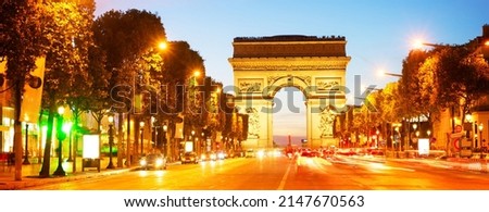Arc de Triomphe and Champ Elysees at night, Paris, France, retro toned