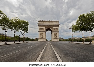 Arc De Triomphe In Paris During COVID19 Confinement. Empty Street And No Trafic Car At All.