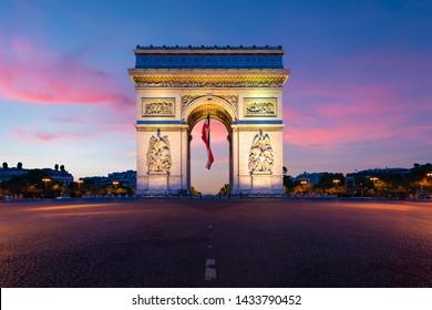 Arc de Triomphe de Paris at night in Paris, France. Landscape and Landmarks travel, or historical building and sightseeing in Europe concept - Powered by Shutterstock