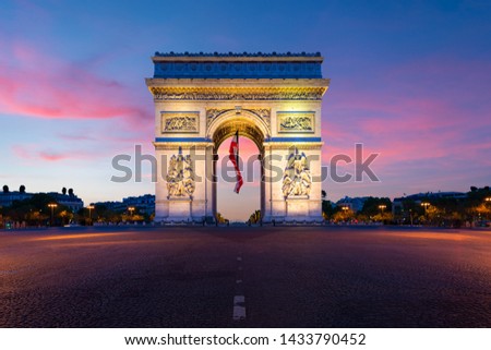 Arc de Triomphe de Paris at night in Paris, France. Landscape and Landmarks travel, or historical building and sightseeing in Europe concept