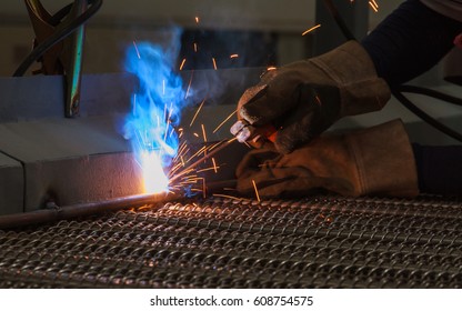 Arc Welding And Welding Fumes, Worker Welding On Steel In Manufacturing Industry.