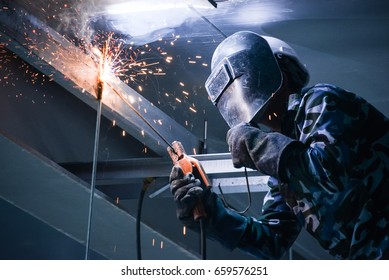 Arc welding of a steel in construction site - Shutterstock ID 659576251