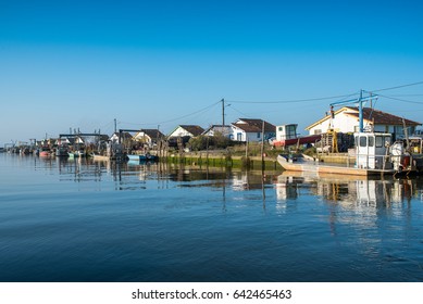 ARCACHON BAY (France), Arès, oyster village and boats - Shutterstock ID 642465463