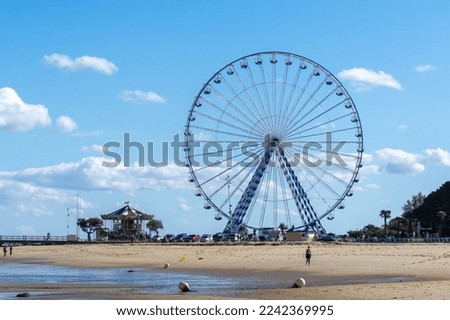 Arcachon, in Gironde, France. A Ferris wheel is installed each fall near the Pierre Lataillade jetty