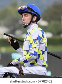 ARCADIA, CA - DEC 26: Jockey Michael Baze Enters The Track Aboard Champagne D'Oro To Compete In The La Brea Stakes At Santa Anita Park On Dec 26, 2010 In Arcadia, CA.