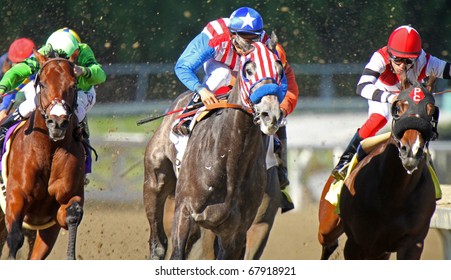 ARCADIA, CA - DEC 27: Jockey Rafael Bejarano Guides Uncle Sam (red & White Stripes) To His First Win At Santa Anita Park On Dec 27, 2010 In Arcadia, CA.