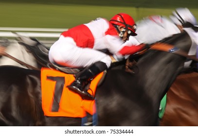 ARCADIA, CA - FEB 10, 2010: Jockey Joel Rosario Competes In A Thoroughbred Race At Historic Santa Anita Park On Feb 10, 2010 In Arcadia, CA.