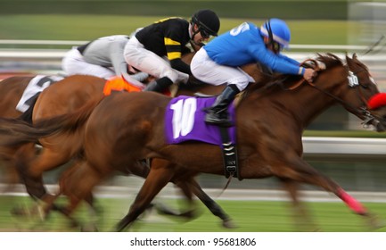 ARCADIA, CA - FEB 19: Jockeys Struggle For The Lead In A Maiden Race At Santa Anita Park In Arcadia, CA, On Feb 19, 2012.