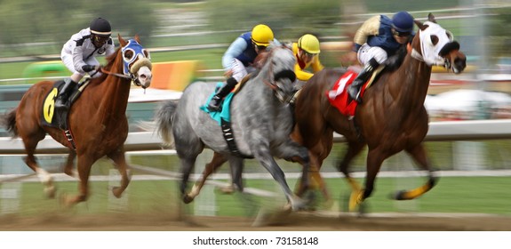 ARCADIA, CA - MAR 12: A Field Of Thoroughbreds Storm Down The Homestretch In A Claiming Race At Santa Anita Park On Mar 12, 2011 In Arcadia, CA.