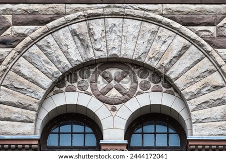 Arch decoration in window. Colonial architectural feature or detail in Old City Hall Building (1898), Toronto, Canada