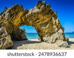 The Arch is a distinctive rock formation located at the west end of Mile Beach at the north end of The Neck that separates the north and south half of Bruny Island, Tasmania, Australia.