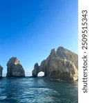 The Arch, El Arco, on the coast of Cabo San Lucas, Mexico, BCS, beautiful nature seascape with land formations, mother nature, explore travel and see the world, sunset sky at dusk out on the ocean