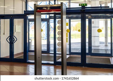 Arch Of Metal Detectors. Security. Walk Through Detector. Checking People At The Entrance To The Building. 