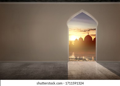 The Arch On The Wall With Mosque View And Sunset Sky Background