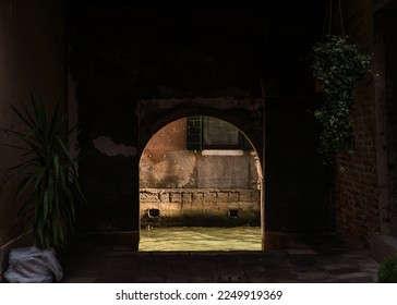 Arch passageway leading to a canal in Venice, Italy. - Powered by Shutterstock