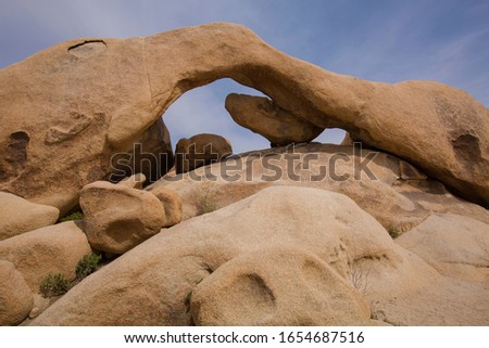 Arch Rock is within granite formations at Joshua Tree National Park