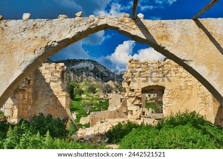 Arch in the ruined 12th-century Knights Templar stronghold in the abandoned village of Foinikas (aka Phoinikas, Finikas) in the Xeropotamos valley, district of Paphos, Cyprus
