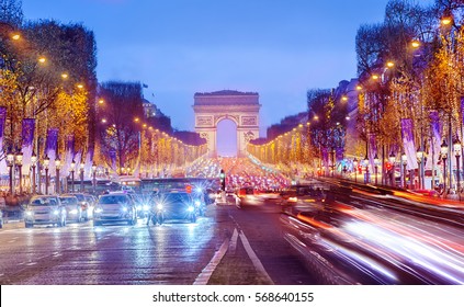 Arch Of Triumph And Champs Elysees In Paris At Night, France