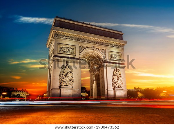 Arch\
of Triumph in Paris at sunny sunrise, long\
exposure