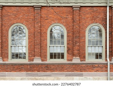 Arch windows of old brick building in Harvard University, Cambridge city, MA, USA - Powered by Shutterstock