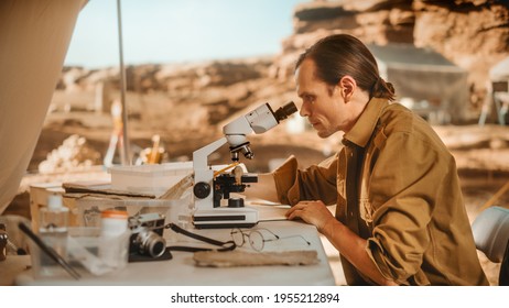 Archaeological Digging Site: Great Male Archaeologist Doing Cultural Research, Discovers Ancient Civilization Historical Artifacts, Fossil Remains at Excavation Site, Study it Under Microscope