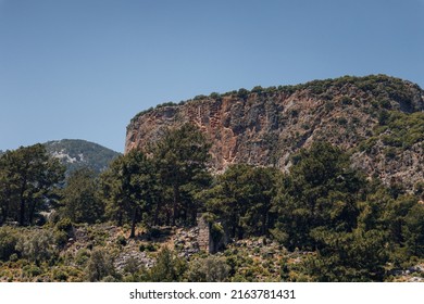 Archaeological remains of the Lycian rock cut tombs. Lycian Tombs. Unique ancient necropolis. Ancient Greek burials. Tourism and attractions. The ancient Greek city of Pinara, Turkey