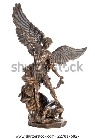 Archangel Michael bronze statue isolated on white background. Vertical shot.
