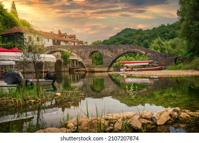 Arched bridge in Cetinje, small town in Montenegro, at sunset - Shutterstock ID 2107207874